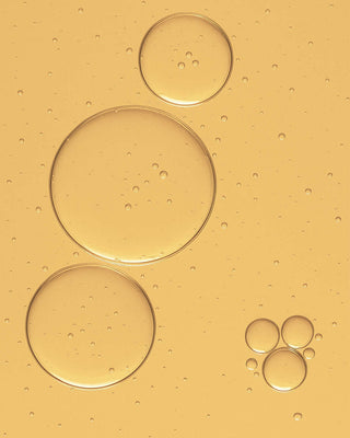 Huile de sésame bio basic. - texture dorée huile végétale pure