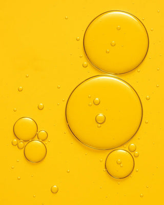 huile de jojoba basic. - texture dorée huile végétale pure