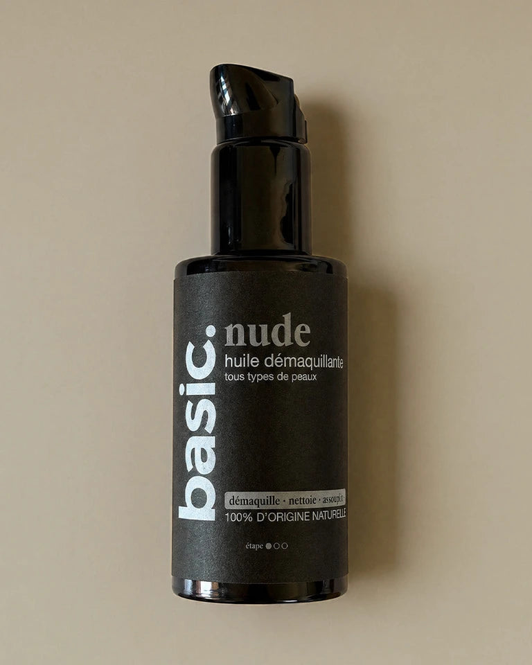 Bottle of nude makeup remover oil